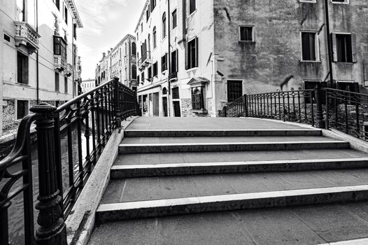 Deserted Venice in black and white. Museum City is situated across a group of islands that are separated by canals and linked by empty bridges.  