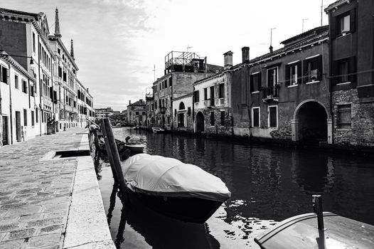 Deserted Venice in black and white. Museum City is situated across a group of islands that are separated by canals and linked by empty bridges.  