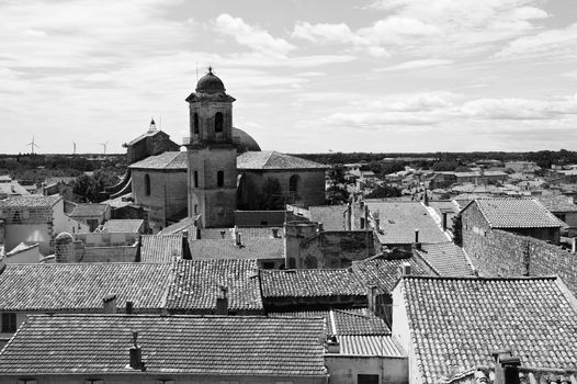 Deserted tiled roofs of France in black and white. An optimistic view over a sleepy city of Beaucaire 