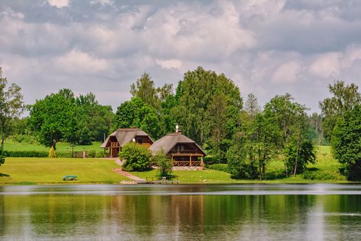 Two houses on the bank of the river