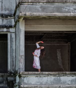 Zombie Ghost woman murder with bloody stand dance on abandoned building ,halloween concept