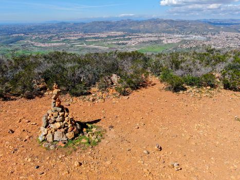 Balancing and concentration pile of rocks. Relaxation and meditation through simplicity harmony and rock balance lead to health and wellness. pile of rocks made on the top of the mountain. California