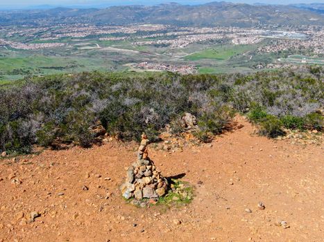 Balancing and concentration pile of rocks. Relaxation and meditation through simplicity harmony and rock balance lead to health and wellness. pile of rocks made on the top of the mountain. California