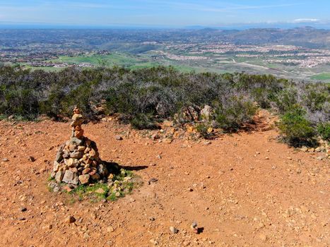 Balancing and concentration pile of rocks. Relaxation and meditation through simplicity harmony and rock balance lead to health and wellness. pile of rocks made on the top of the mountain. California