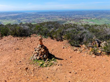 Balancing and concentration pile of rocks. Relaxation and meditation through simplicity harmony and rock balance lead to health and wellness. pile of rocks made on the top of the mountain. California