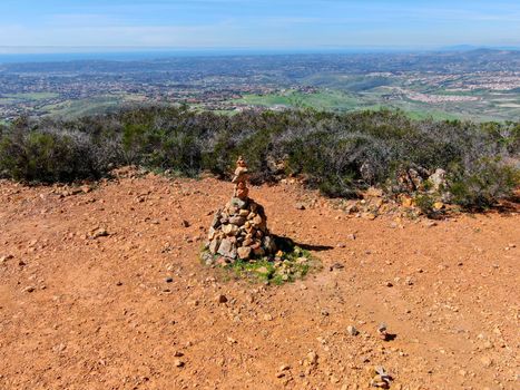 Balancing and concentration pile of rocks. Relaxation and meditation through simplicity harmony and rock balance lead to health and wellness. pile of rocks made on the top of the mountain. California