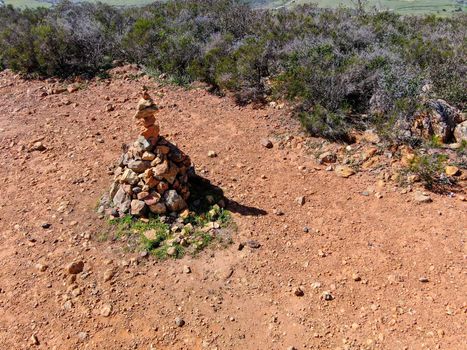 Balancing and concentration pile of rocks. Relaxation and meditation through simplicity harmony and rock balance lead to health and wellness. pile of rocks made on the top of the mountain. California