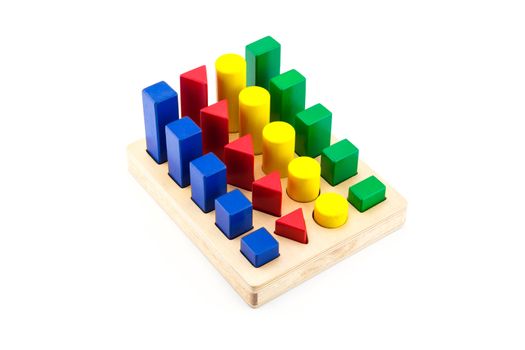 toy wood block multicolor building construction bricks isolated on white background.