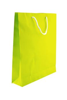 Green paper shopping bag isolated on white background.