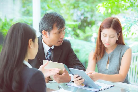 young business people making meeting and talking for analyzing marketing working at office on desk.