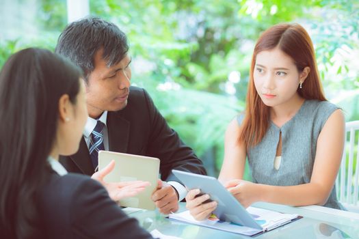 young business people making meeting and talking for analyzing marketing working at office on desk.