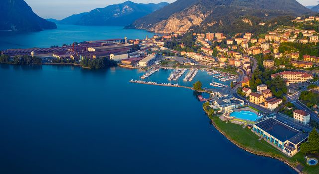 Aerial view of Lake Iseo at sunrise, on the right the port of lovere,background mountains(alps), Bergamo Italy.