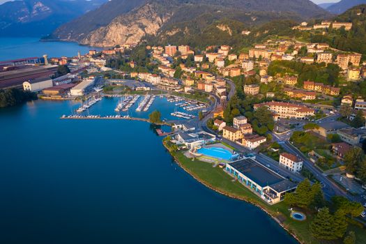 Aerial view of Lake Iseo at sunrise, on the right the port of lovere,background mountains(alps), Bergamo Italy.