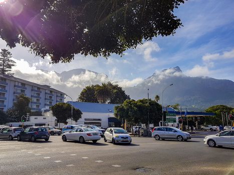 Typical road with Table Mountain National Park in Cape Town, South Africa.