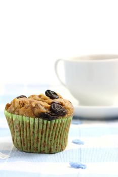 Muffin with raisins with coffee
