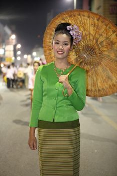 Loy Krathong festival in Chiangmai.People parade in Loy Krathong festival.on November 8,2011 in Chiangmai, Thailand. 
