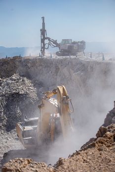 Crawler excavator, working to transport rocks at coal mines