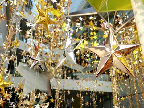 Shinny modern style decoration star for Christmas and New Year celebration festive and outdoor shot.