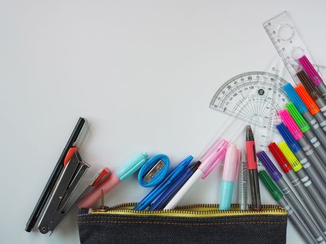 School supplies Placed on a white background in the top view pattern And have free space.