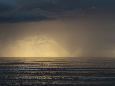 The Baltic Sea at sunset, stormy dramatic clouds. storm Passing over Sea, Sunset and dark clouds after storm. The Vacation, summer concept