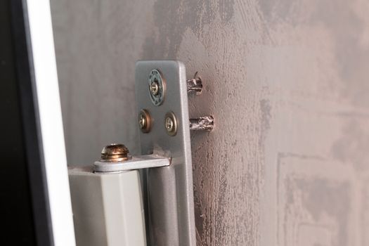 weak plastic dowels come out from wall and monitor or tv mount.