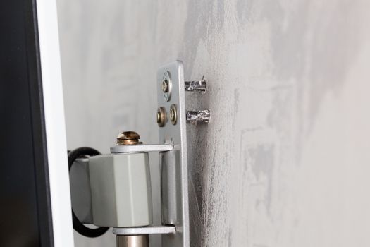weak plastic dowels come out from wall and monitor or tv moun.