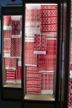 texture of towels embroidered with the national red and white at the fair of folk crafts, collection, Belarus