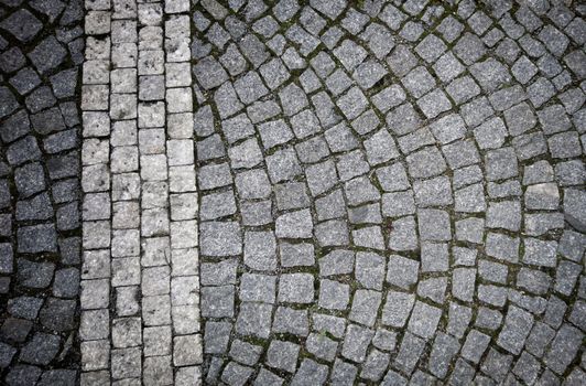 Cobblestone old path background in black and white.