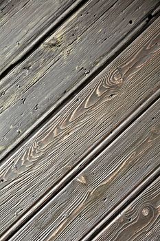 Texture of an Old Brown Wood Surface with Oblique Grainy Natural Pattern.