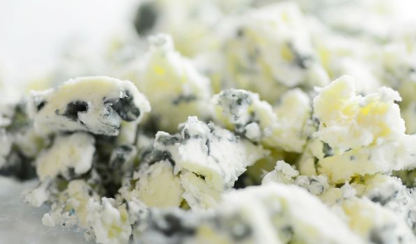 Macro Shot of a Grated Blue Cheese with Visible Cultures of the Mold Penicillium.