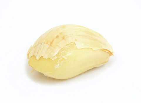 Clove of garlic on white background.