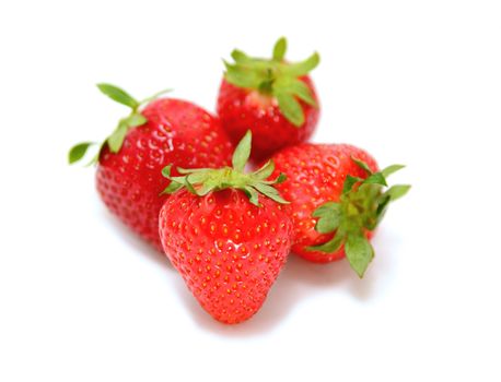 Group of fresh juicy strawberries over white background.