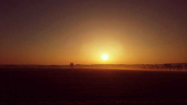 Beautiful colorful sunrise over morning landscape.