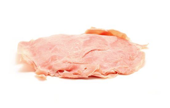 Heap of thinly sliced ham on white background.