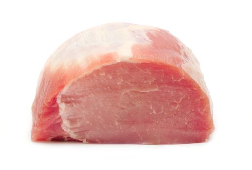 Whole piece of fresh raw pork loin over white background.