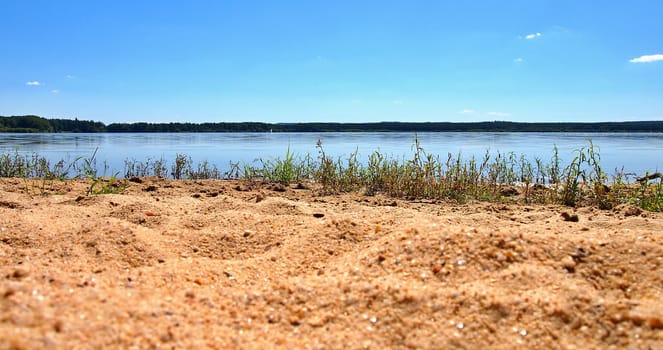 Sandy shore of beautiful Dvoriste pond near Trebon city in South Bohemia, Czech Republic.