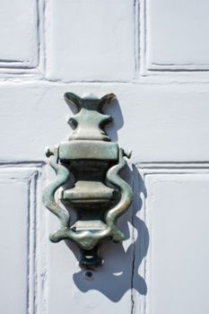 brass door knockers on cottage doors in the Cotswolds