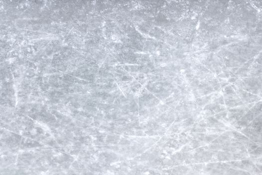 Scratches on a skating rink on ice.