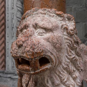 Close up of a marble sculpture depicting a lion.