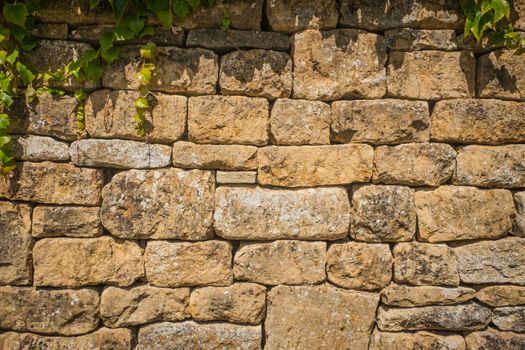 A wall made from traditional English Cotswold stone UK