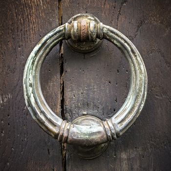 Close-up of an old swing oxidized by time.