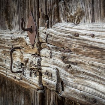 An old wooden door exposed to the elements.