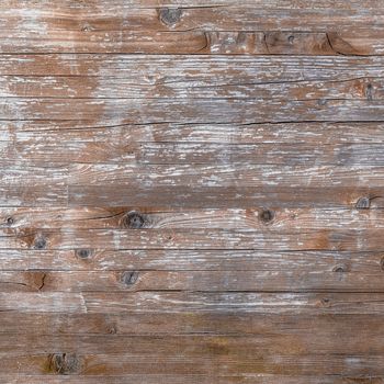 Planks of rustic wood with light brown tones.