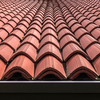 Front view of a tiled roof brown.