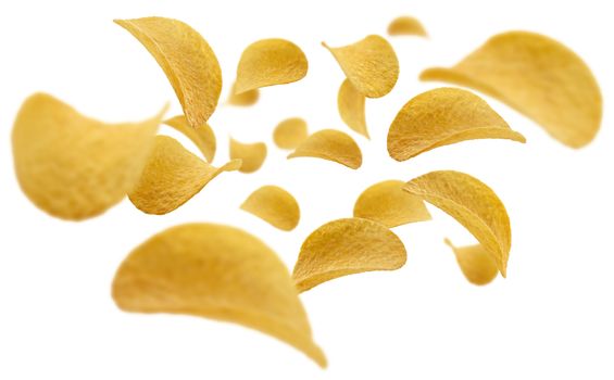 Potato chips levitate on a white background.