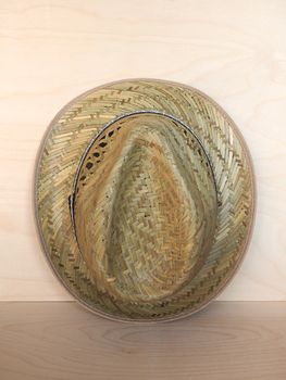 Brimmed straw hat woven out of straw