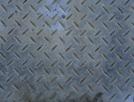 old rusty metal manhole cover abstract background