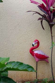 Sculpture of a flamingo ornamenting a garden