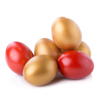 Golden Egg and Red Egg isolated on a white background.