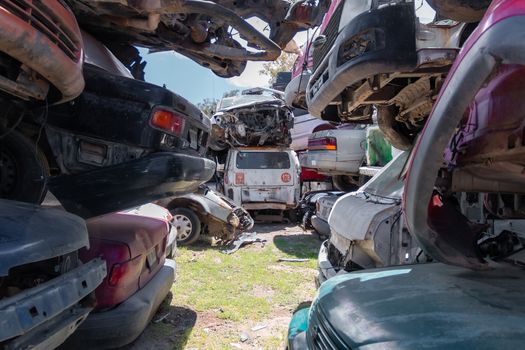 Old damaged cars on the junkyard waiting for recycling in Mexico City. Mexico